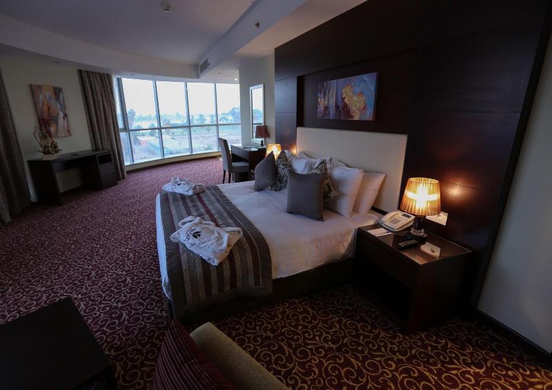 Tolip El Forsan Hotel Ismailia Eksteriør bilde A bedroom at the hotel